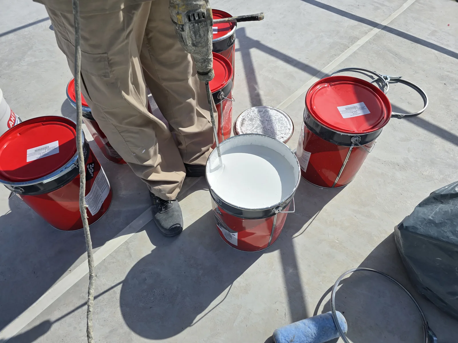 Waterproofing materials and work equipment on a rooftop