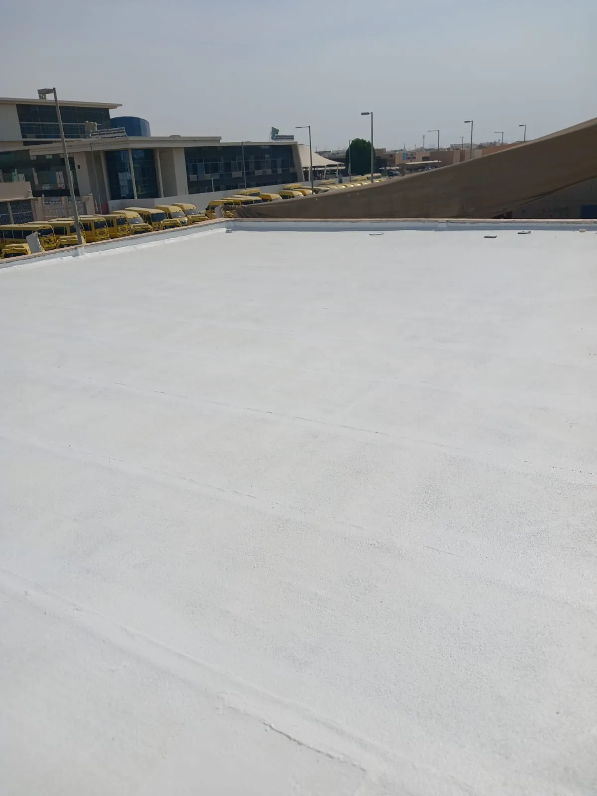 Rooftop waterproofing surface with mechanical equipment